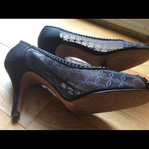 Elegant black semi sheer high heels